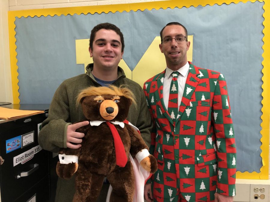 Mr.+Eliot+teaches+student+Emre+Altunisik+in+his+holiday+attire.+