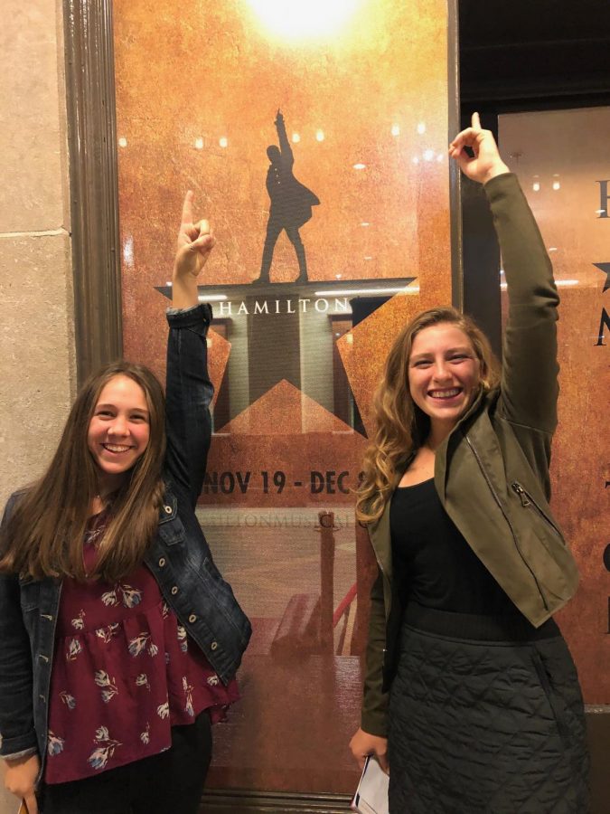 Lauren Cassano and Ellie Dreyer replicate the famous Hamilton poster.