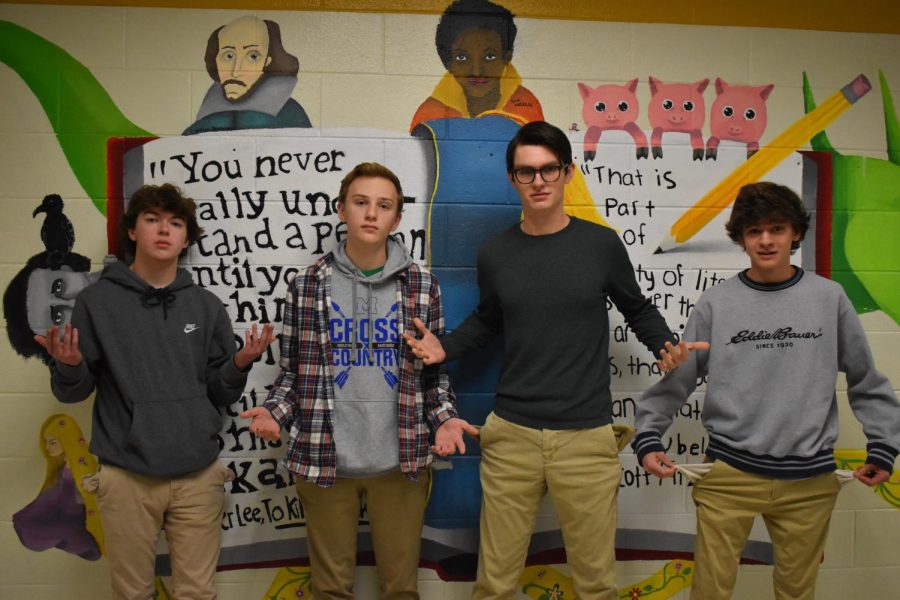 Will Acker, James Galloway, Bailey Carter, and Jack Pitts stand with pockets inside out, signifying the need for student discounts.