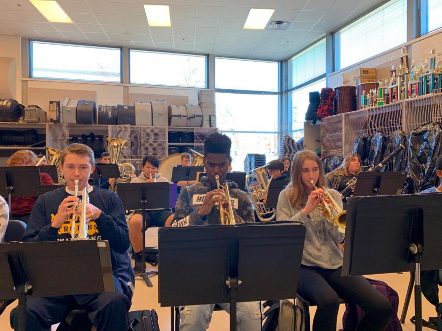 Midlothian band members practice their challenging new music. 