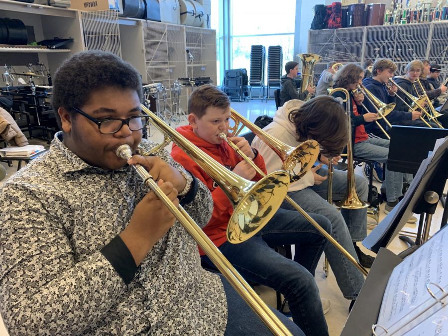 The low brass section of the Midlothian Symphonic Band practices their new music.