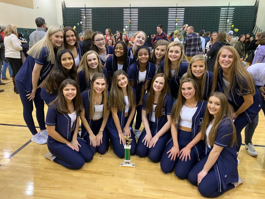 The Midlo Trojanettes compete at the Kelly Green Invitational.