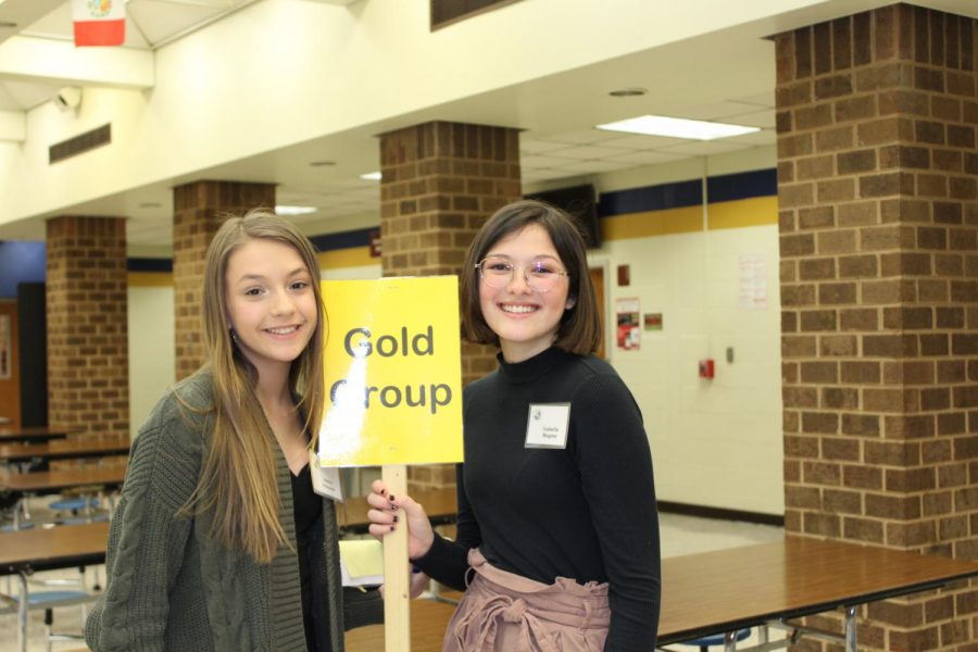 Sydney Prussman and Isabella Wagner lead the Gold Group interviewees through Midlothian High School at the 2020 IB Interview Day.