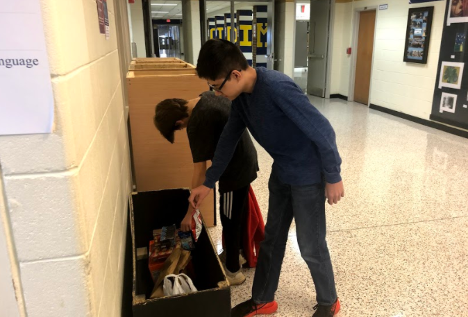 Freshmen do their part by collecting treats for military travelers.