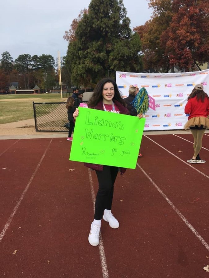 Noelia McCaffery volunteers at the ASK 5k in Richmond, VA to raise awareness for childhood cancer. 