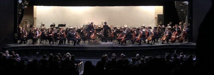 Julian Schwarz takes the stage at Midlothian High School as he prepares to perform his solo with the Richmond Symphony. 