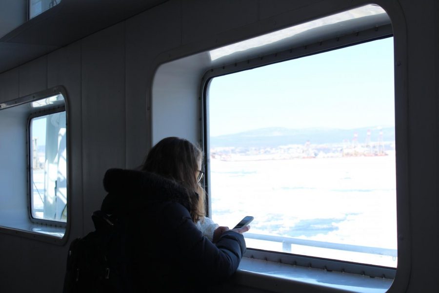 Madame Foster enjoys the beautiful scenery of the frozen St. Lawrence river. 