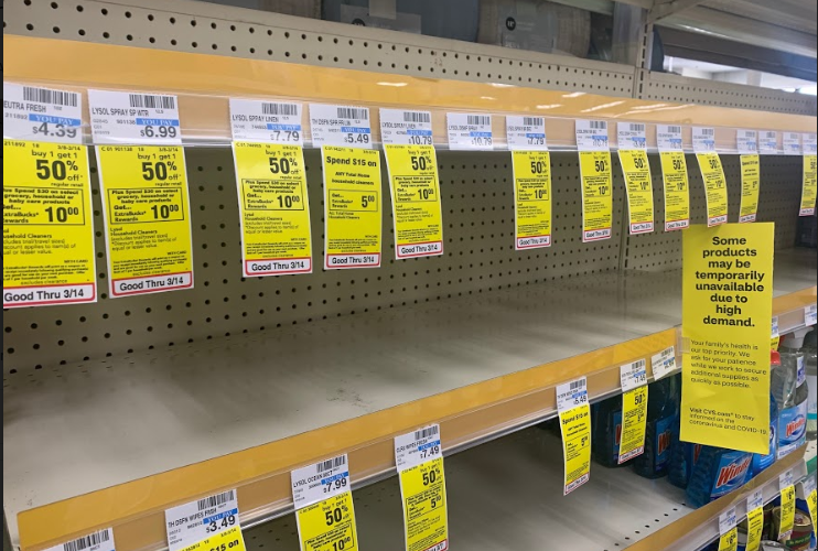 The shelves are empty as shoppers stock up on home necessities. 