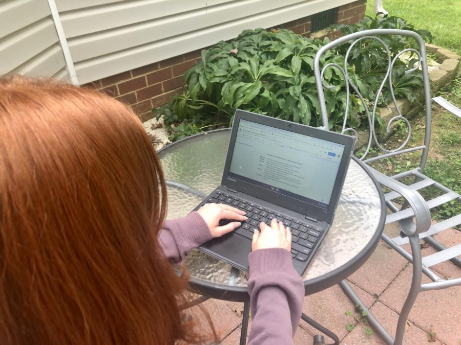Quinn Downing takes Renaissance notes outside for World History as she progresses through the first weeks of virtual school.
