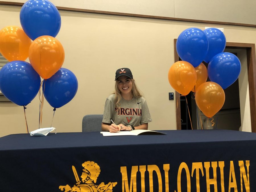 Senior Caroline Bowe signs to run Division 1 Cross Country and Track & Field at the University of Virginia.