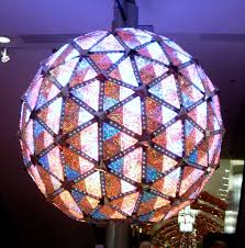 The illuminated ball makes its way to the ground during the countdown to the New Year.