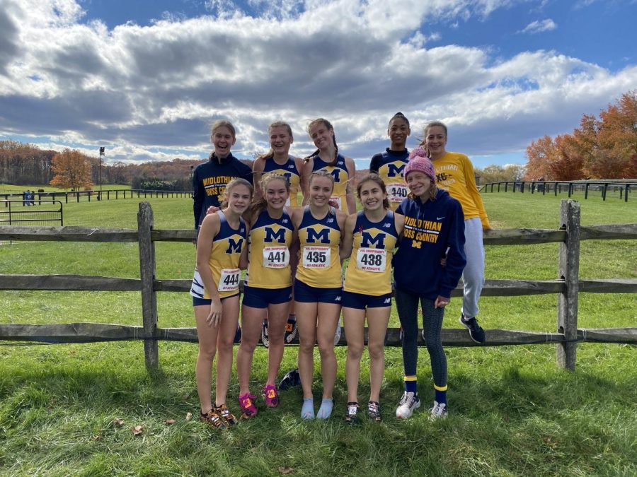 The+Midlo+Varsity+Girls+XC+team+celebrates+their+second+place+finish+at+the+State+Championship+2021.