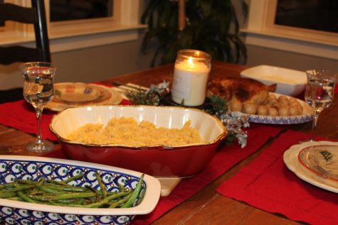 Family-style mac-n-cheese, mashed potatoes, green beans, chicken and pie make for the perfect Christmas dinner.