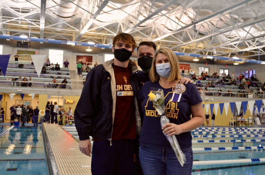 Matt Duren and his parents support his years of swim.