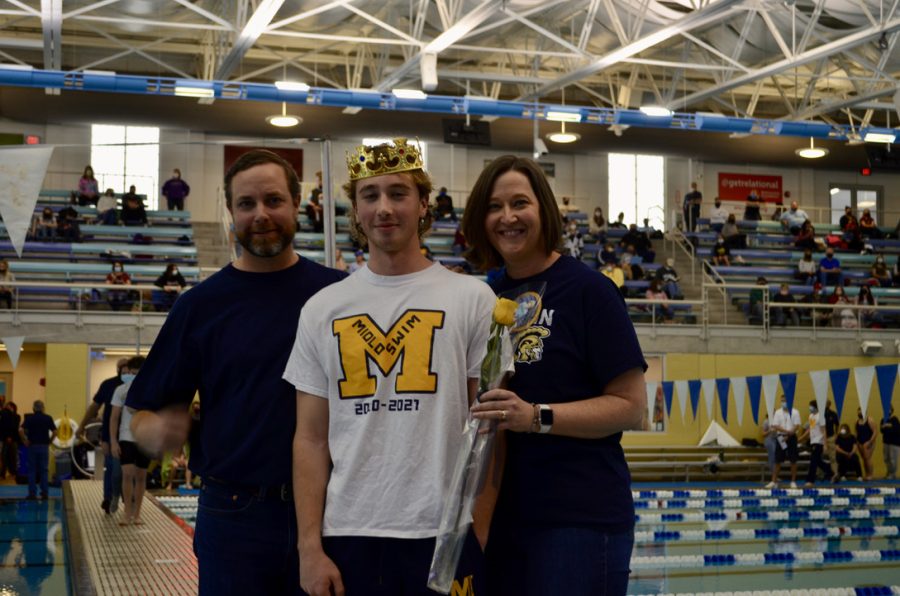 Jackson McCarthy and his parents celebrates the 2022 senior swim night. 
