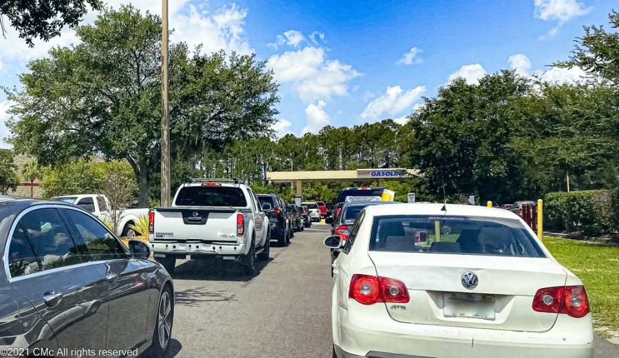 Lines pile up as Americans rush to stock up on gas amid the shortage.