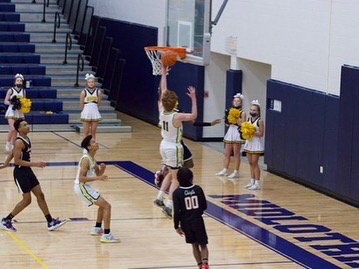 Senior Jack Scott scores a 2-pointer in the game against James River 