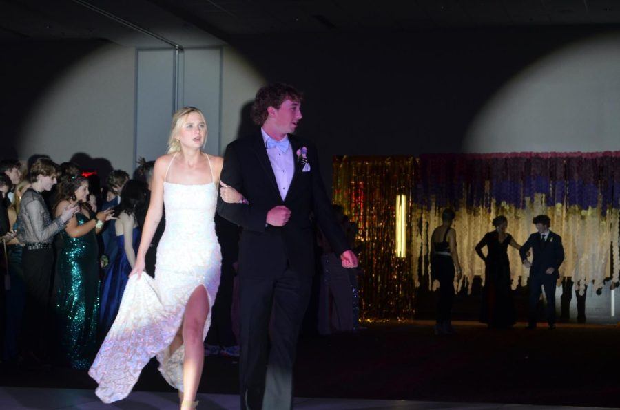 Courtney Coppage and  Jackson McCarthy make their way down the Prom court.