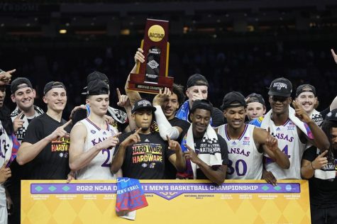 The Kansas Jayhawks hoist the NCAA mens championship trophy