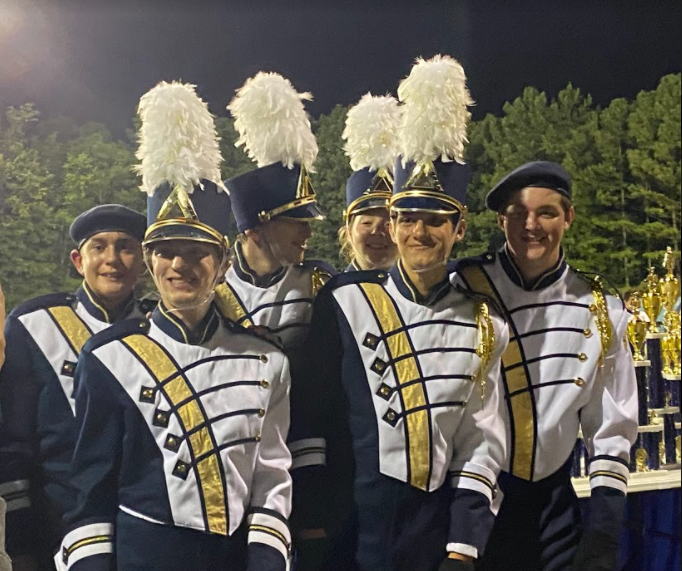 Before giving out awards, Midlothian band members smile at the crowd.