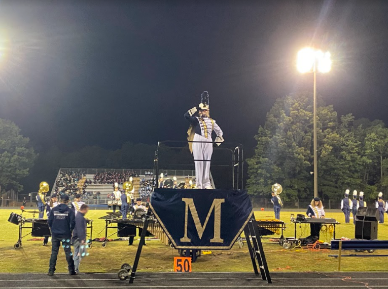 Drum Major Kate Tabor signals that Midlothian is ready to begin their performance.