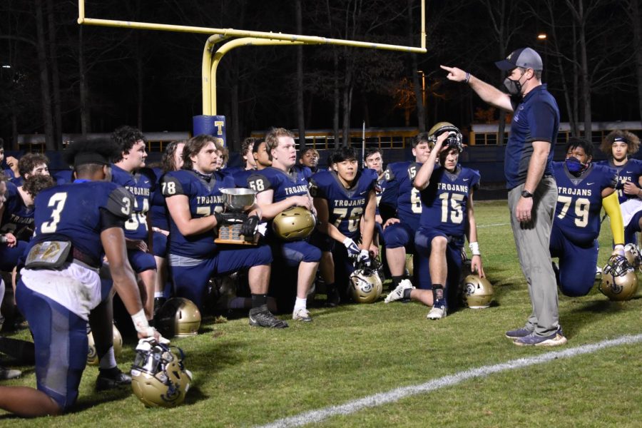 Coach Mathew Hutchings gives a speech to his team after emerging victorious in the coal bowl
