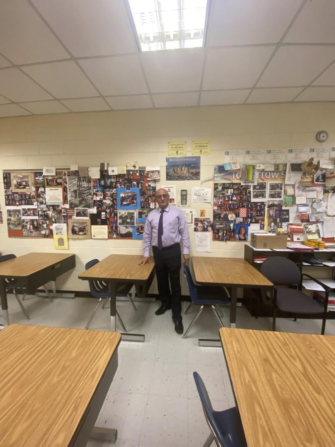 Sharobim pictured in front of his wall that is "my everything"