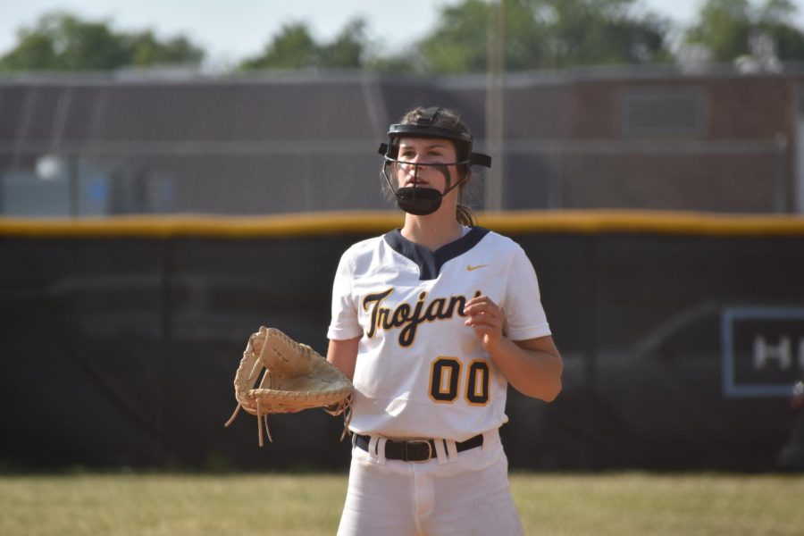 Senior Catcher warms up with her pitcher before their home game