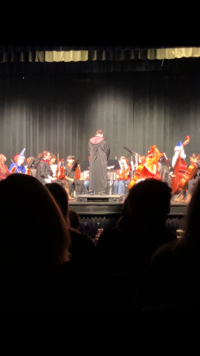Harry Grossman readies the Midlothian High School orchestra.